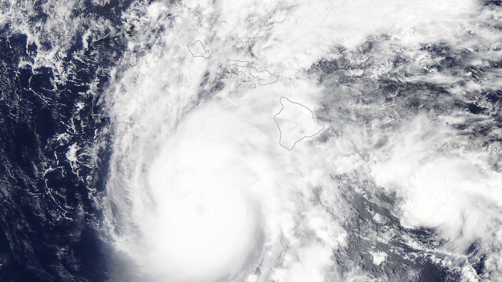 Hurricane Nolo is forecast to drop up to 35 inches of rain on Hawaii's Big Island without making landfall — the third hurricane to hit the state in six weeks, and the slowest