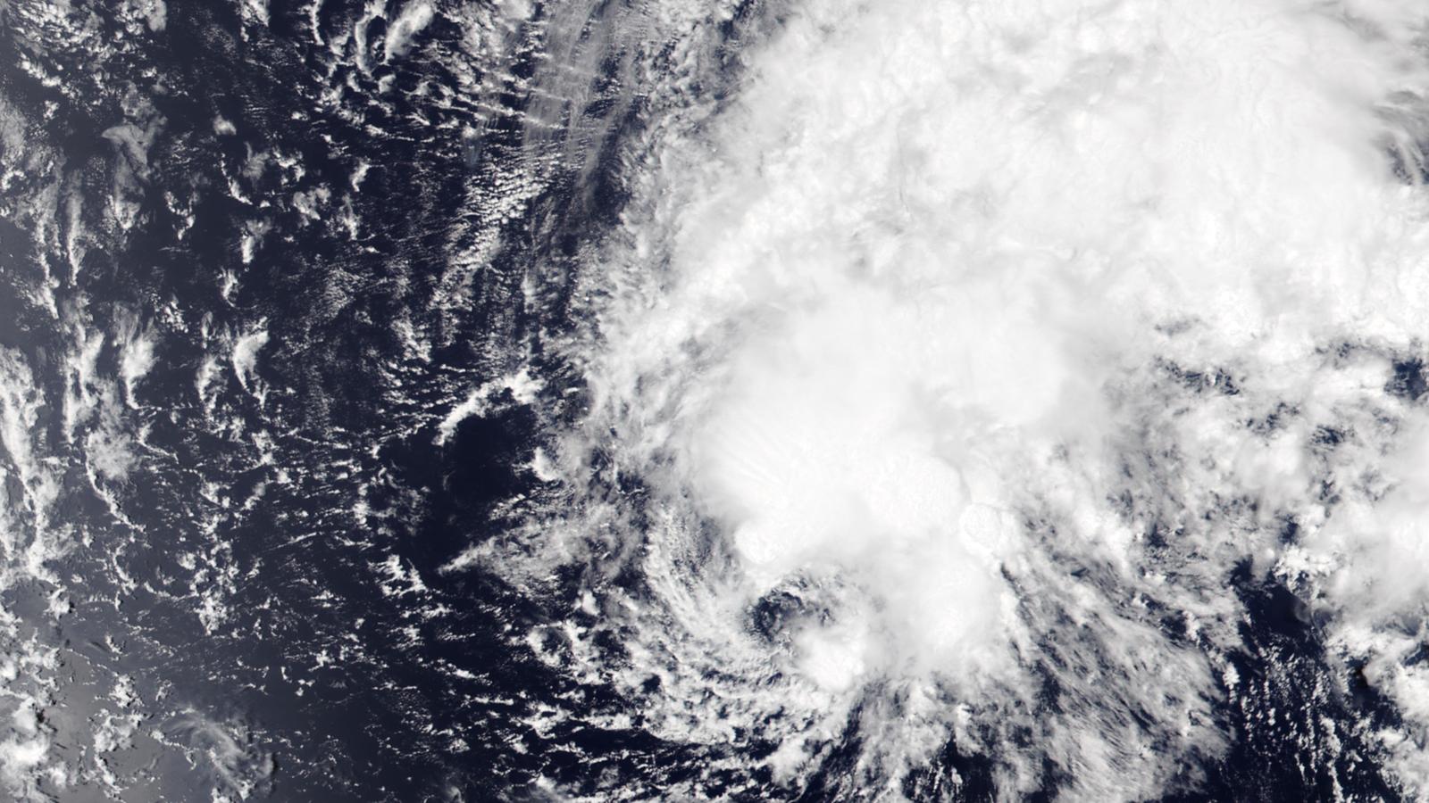 Tropical Storm Moke takes aim at a Big Island still digging out of Lala's mud, with up to 15 inches of rain in the forecast
